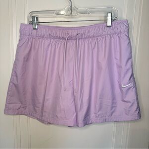NWT WOMENS NIKE SPORTSWEAR ESSENTIALS REPEL MID-RISE SHORTS large purple 4.5”